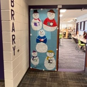 Snowman in the library door